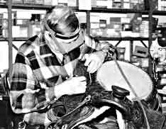 Walt working on a saddle